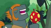 Rogue about to eat a jungle fruit S9E21