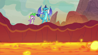 Spike and Ember watch the lava pool drain S9E9