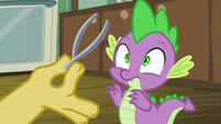 Discord presenting a pair of tweezers S8E10