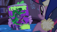 Spike showing Twilight the comic book cover S4E6