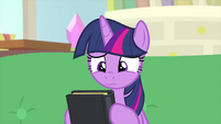 Twilight looks uncertain at hypnosis book MLPS4