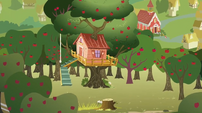 A certain clubhouse in said certain apple orchard.