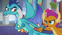 Ember dragging Smolder by the claw S8E1