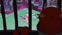 Mane Seven walk past caged creatures S8E25