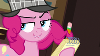 Pinkie Pie jots down notes with her mane S7E23