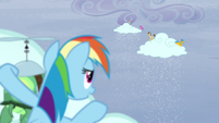 Rainbow behind a cloud sees ponies making the clouds snow S5E5