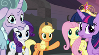 Applejack pointing back at the crater S7E26