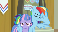 Rainbow smacks her face with her wing S9E6