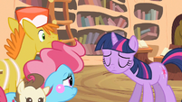 Twilight shaking her head.