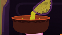 Curry being poured into a bowl S6E12