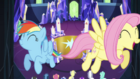 Rainbow and Fluttershy fly through the castle S4E26