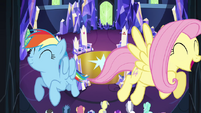 Rainbow and Fluttershy fly through the castle S4E26