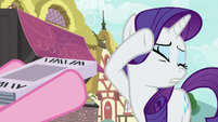 Rarity can't bear to look at the magazine S7E19