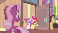 CMC with glasses entering the lobby S4E19