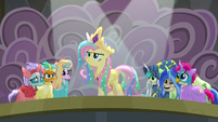 Fluttershy standing confidently on stage S8E7