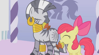 Zecora and Apple Bloom finish adding the ingredients S1E09