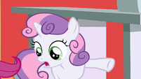 Sweetie Belle points her hoof out to Scootaloo S2E23