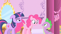 Spike fails to notice Twilight's facial expression.