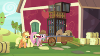 Wrangler showing cages to Fluttershy S7E5