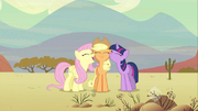 Fluttershy and Twilight nuzzling Applejack S2E14