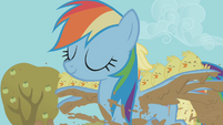 Rainbow Dash carrying baby chicks over the mud-filled trench S01E13