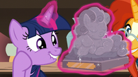 Twilight marveling at antique pony statuette S7E24