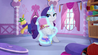 Opalescence getting packed in Rarity's bag MLPRR