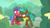 Spur protecting Biscuit from swamp ponies S9E22