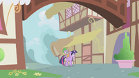 Twilight and Spike walking into town S1E03
