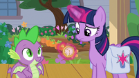 Twilight looking at a pocketwatch S9E5