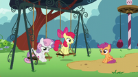 Apple Bloom stands up on the swing S6E4