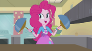 Pinkie Pie mixing batter in two bowls EG2