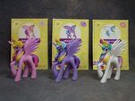 English monolingual version of mystery pack wave 5, cards 2, 7, and 19 of 24: Princess Cadance, Princess Luna, and Princess Celestia