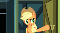 Applejack opens the door.