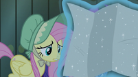 Fluttershy looking at a map of Equestria S7E26