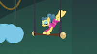 Trapeze star pony on the trapeze bar S6E20