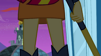 Sunset Shimmer appears next to the statue EG