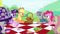 Main cast looking at Maud eating the gem S4E18