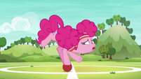 Pinkie Pie nervously balanced on a softball S6E18