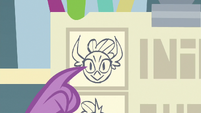 Spike pointing to picture of Smolder S8E2