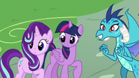 Starlight, Twilight, and Ember see Spike coming S7E15