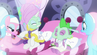 Spike happily eating a cucumber slice S9E19