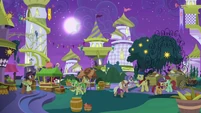 Appleloosan ponies around the food stands S9E17