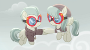 Pickle and Barley hoof-bumping in goggles MLPRR