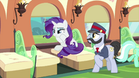 Rarity sitting depressed on the train MLPS1