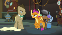 Smolder sits in Dr. Hooves' time machine S9E20