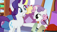 Sweetie Belle pops out of Rarity's fabrics S8E12