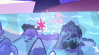 Twilight and Fluttershy's cutie marks float over Smokey Mountains S5E23