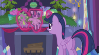 Twilight hanging dolls above the fireplace S5E20