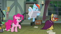 A. K. Yearling looks away as Rainbow Dash reads S7E18